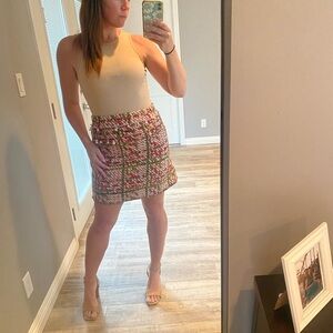 Zara mini skirt withh great detail.  Size med.  gently worn